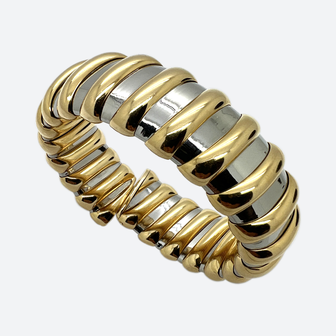 1980s steel and gold bangle signed Bulgari